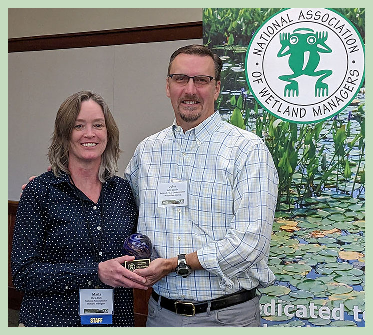 John Gooding Receiving Distinguished Honor Award from Marla Stelk